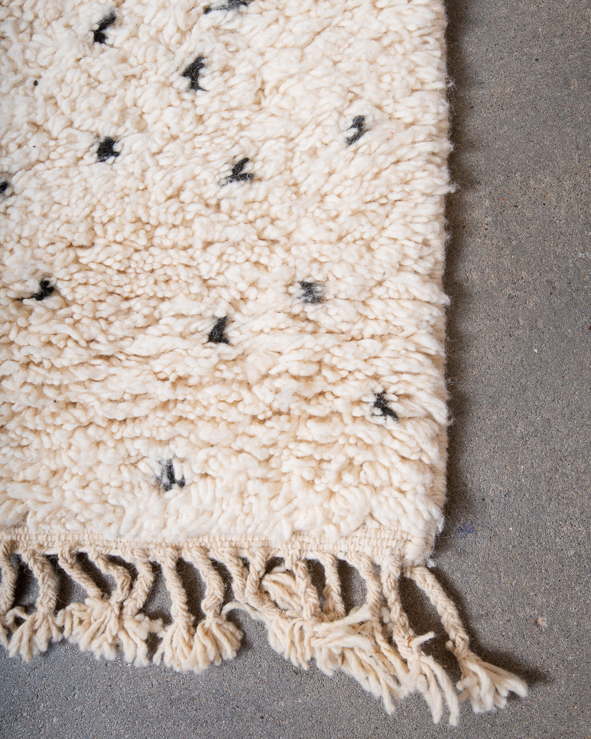 Modern, designer, handcrafted Berber rug from Morocco. Beniourain carpet with beautiful colours and patterns and fluffy wool texture.